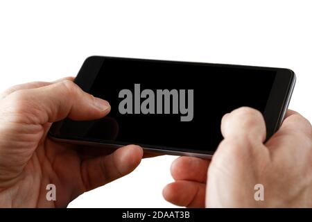 Nahaufnahme menschliche Hände halten Smartphone und mit Touchscreen. Isoliert auf Weiß. Copyspace. Stockfoto