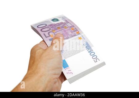 Nahaufnahme die Hand eines Mannes hält ein Bündel von auf Weiß isolierten Euro-Scheinen. Finanzkonzepte. Geld in der Hand. Stockfoto