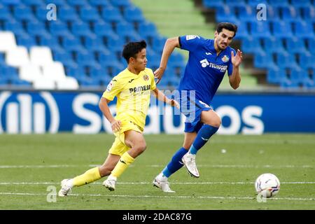 Jose Manuel 'Chema' Rodriguez von Getafe und Takefusa Kubo von Villarreal in Aktion während der spanischen Meisterschaft La Liga Fußball Übereinstimmung zwischen get P Stockfoto