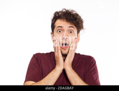 Porträt des jungen Mannes mit schockiert Gesichtsausdruck Stockfoto