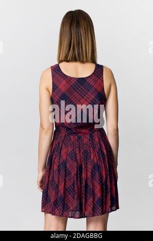 Rückansicht einer jungen Frau mit braunem Haar Stockfoto