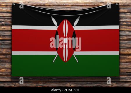 3D-Darstellung der nationalen Stoffflagge Kenias an einer Holzwand genagelt.Ländersymbol. Stockfoto