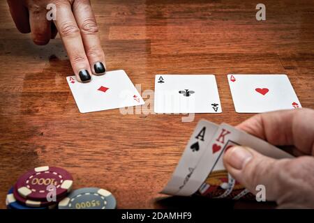 Texas Holdem, drei Asse auf dem Flop in texas Holdem, Ass und König in der Hand Stockfoto