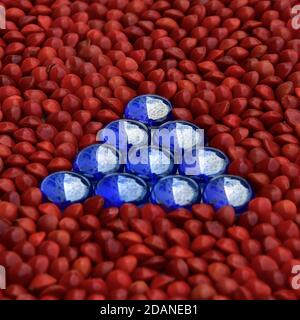 Dreieck aus blau irisierenden Glasperlen isoliert auf einem Hintergrund von glänzenden roten Perlen. Stockfoto