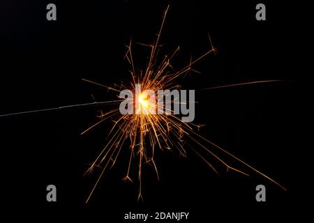 Ein leuchtender Funkenfunker, der abstrakte Funken zeigt Stockfoto