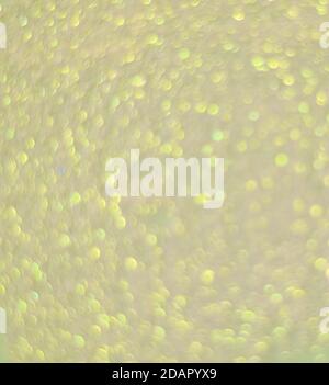 Gelbe Pailletten, verschwommener abstrakter Hintergrund Stockfoto