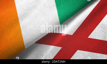 Elfenbeinküste Elfenbeinküste Elfenbeinküste und Nordirland zwei Flaggen Textil Stoff Stockfoto