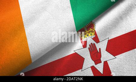 Elfenbeinküste Elfenbeinküste Elfenbeinküste und Nordirland zwei Flaggen Textil Stoff Stockfoto