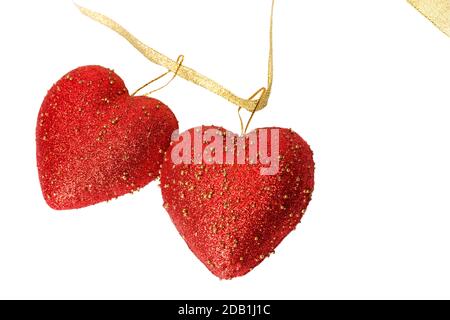 Zwei Herzen valentine in Gold Band isoliert auf weißem Hintergrund Stockfoto
