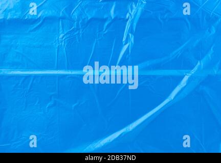 Zerknitterte blaue Polyethylentextur, Nahaufnahme, Vollbild Stockfoto
