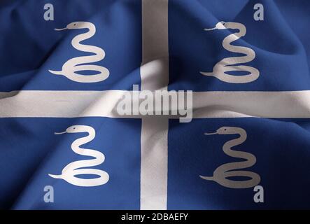 Nahaufnahme der Flagge von Ruffled Martinique, die Flagge von Martinique weht im Wind Stockfoto