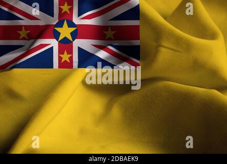 Nahaufnahme der Ruffled Niue Flagge, Niue Flagge weht im Wind Stockfoto