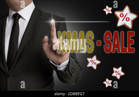 XMAS Sale Touchscreen gesteuert Geschäftsmann. Stockfoto