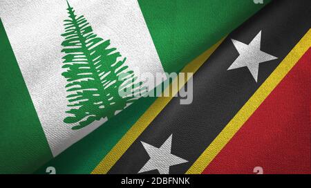 Norfolk Island und Saint Kitts und Nevis zwei Flaggen Textiltuch, Stoff Textur Stockfoto