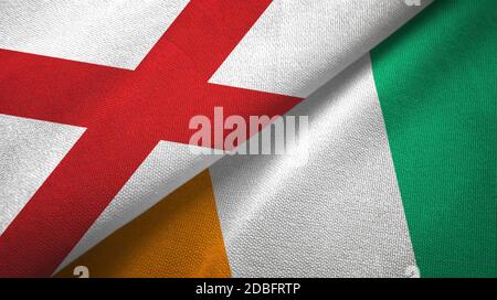 Nordirland Saint Patrick's Saltyre und Cote d'Ivoire Elfenbeinküste Zwei Flaggen Stockfoto