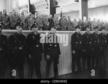 In der Luitpoldarena während der Eröffnungszeremonie des NSDAP-Kongresses in Nürnberg. Von links nach rechts: Hans Frank, Alfred Rosenberg, Wilhelm Frick, Joseph Goebbels, Robert Ley, Franz Xaver Schwarz, Heinrich Himmler, Viktor Lutze, Rudolf Hess, Julius Streicher. Weiter rechts: Hermann Göring, Bernhard Rust, Adolf Huehnlein, Amann. Hinter Ley: Wilhelm Brückner. Stockfoto