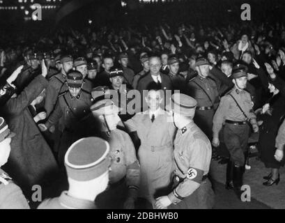 At a rally in the Sportpalast Berlin, Gauleiter of Greater Berlin, Goebbels, is accompanied by a guard of honour. Stock Photo