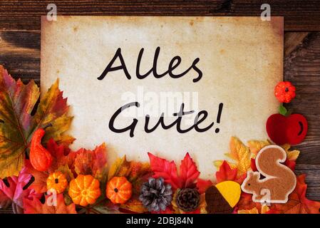 Altes Papier Mit Deutschem Text Alles Gute Bedeutet Beste Wünsche. Bunte Herbst Dekoration wie Kürbis und Blätter Stockfoto