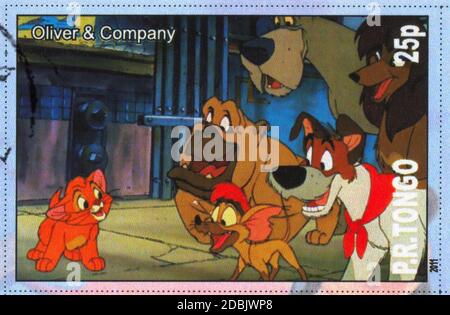 TONGO - UM 2011: Briefmarke gedruckt von Tongo, zeigt Walt Disney Zeichentrickfigur, Oliver und Company, um 2011 Stockfoto