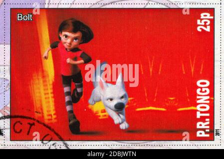 TONGO - UM 2011: Briefmarke gedruckt von Tongo, zeigt Walt Disney Zeichentrickfigur, Bolt, um 2011 Stockfoto