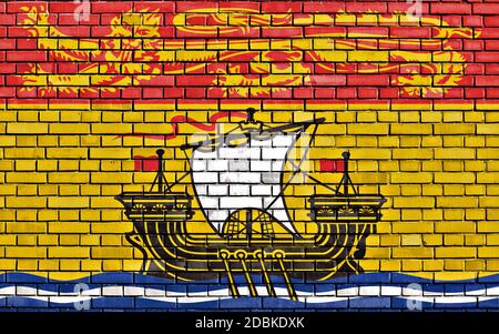 Flagge von New Brunswick auf Mauer gemalt Stockfoto