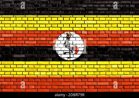 Flagge Ugandas auf Mauer gemalt Stockfoto
