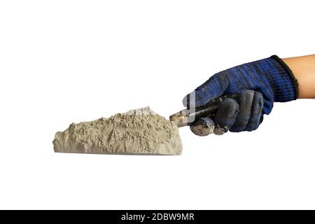 Zement oder Zementpulver auf der Putzkelle, einschließlich der Hände des Bauherrn isoliert auf weißem Hintergrund mit dem Clipping-Pfad. Stockfoto
