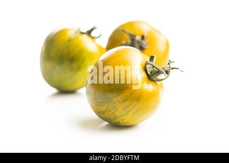 Grüne Zebratomaten isoliert auf weißem Hintergrund. Stockfoto