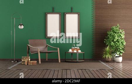 Modischer Ledersessel in einem grünen Wohnzimmer, mit leerem Bilderrahmen und Holzplatte - 3d-Rendering Stockfoto