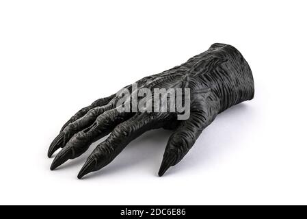 Abgetrennte Monsterhand auf weißem Hintergrund Stockfoto