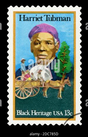 VEREINIGTE STAATEN von AMERIKA - UM 1978: Eine in den Vereinigten Staaten von Amerika gedruckte Marke zeigt Harriet Tubman und Cart, die Sklaven tragen, um 1978 Stockfoto