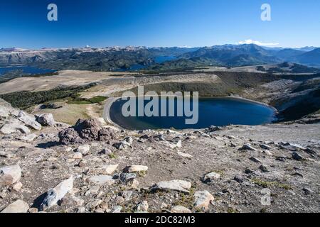 Eine kurze Wanderung zum Gipfel des Volcan Batea Mahuida vom Fuße der Villa Pehuenia. Stockfoto