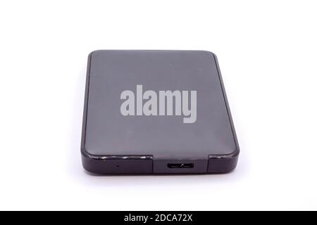 HDD - Gray Portable External Hard Disk Drive isoliert auf weißem Hintergrund. Externe Festplatten. Stockfoto