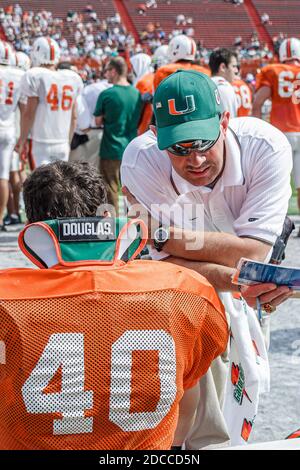 Miami Florida, Orange Bowl University of Miami Hurricanes Canesfest, College-Fußball-Vorsaison Scrimmage-Fans Stadion Spieler Trainer, Stockfoto