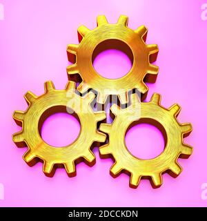 Drei goldene Zahnräder auf rosa Hintergrund Stockfoto