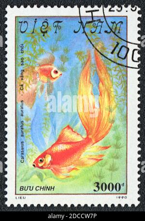 Eine in Vietnam gedruckte Marke zeigt einen Fantail Goldfisch Carassius auratus auratus, Serie 'Goldfisch', 1990 Stockfoto