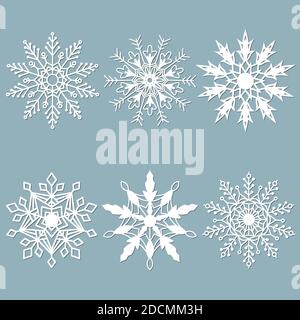 Satz von Schneeflocken. Laser Schnittmuster für Weihnachten Papier Karten, Designelemente, scrapbooking. Vector Illustration Stock Vektor