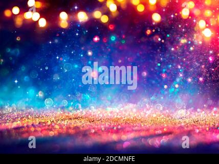 Abstrakt Unscharf Weihnachten Hintergrund - Glänzend Golden Glitter Mit Verschwommen Leuchtet Auf Blauem Hintergrund Stockfoto