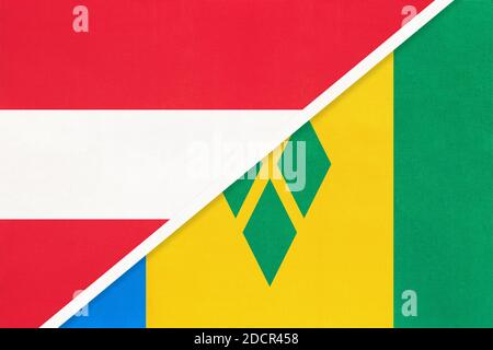 Österreich und St. Vincent und die Grenadinen, Nationalflaggen aus Textil. Beziehung, Partnerschaft und Übereinstimmung zwischen zwei Ländern. Stockfoto