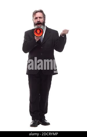 In vollem Wachstum. Ein bärtiger Geschäftsmann mit einem Megaphon. Stockfoto