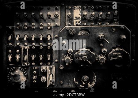 Interior of the old fashioned aircraft glider dashboard of World War II era military transport in black and white. Stockfoto