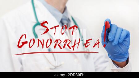 Arzthandschrift mit einem Marker Stop Gonorrhoe. Medizinisches Konzept Stockfoto