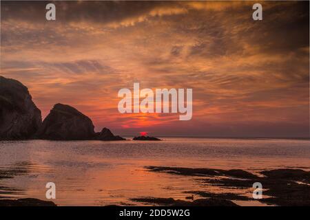 Sonnenuntergang an der Küste in Dorset uk Stockfoto