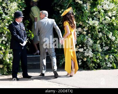 DER US-Schauspieler George Clooney (C) und seine Frau der britische Menschenrechtsanwalt Amal Clooney (R) kommen zur königlichen Hochzeitszeremonie von Großbritanniens Prinz Harry und Meghan Markle am 19. Mai 2018 in der St. George's Chapel in Windsor Castle, in Windsor, Großbritannien, an. Foto von Lauren Hurley/ABACAPRESS;COM Stockfoto