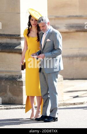 DER US-Schauspieler George Clooney (R) und seine Frau, der britische Menschenrechtsanwalt Amal Clooney, kommen zur königlichen Hochzeitszeremonie von Großbritanniens Prinz Harry und Meghan Markle am 19. Mai 2018 in der St. George's Chapel in Windsor Castle in Windsor, Großbritannien, an. Foto von Lauren Hurley/ABACAPRESS;COM Stockfoto