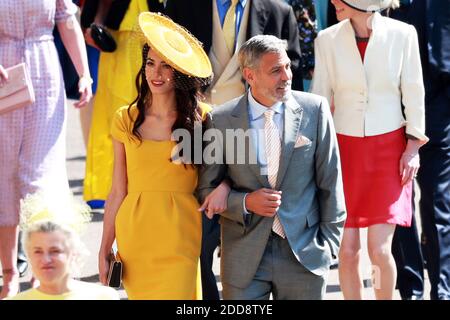 DER US-Schauspieler George Clooney (R) und seine Frau, der britische Menschenrechtsanwalt Amal Clooney (L), kommen zur königlichen Hochzeitszeremonie von Großbritanniens Prinz Harry und Meghan Markle am 19. Mai 2018 in der St. George's Chapel in Windsor Castle, in Windsor, Großbritannien, an. Foto von Lauren Hurley/ABACAPRESS;COM Foto von Lauren Hurley/ABACAPRESS;COM Stockfoto