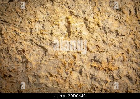 Handgeschnitzte Sandstein Wand Nahaufnahme Detail. Stockfoto