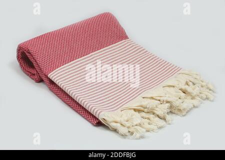 Peshtemal türkisches Bad Baumwolle Handtuch gefaltet Textil. Schöne helle Farben mit natürlichem Licht Hintergrund. Perfekter Online-Markt Digital Shop Verkäufe. Stockfoto