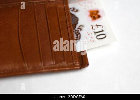 Zehn Pfund Banknote in einer Tasche Stockfoto