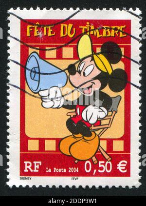 FRANKREICH - UM 2004: Briefmarke gedruckt von Frankreich, zeigt Mickey Maus, um 2004 Stockfoto